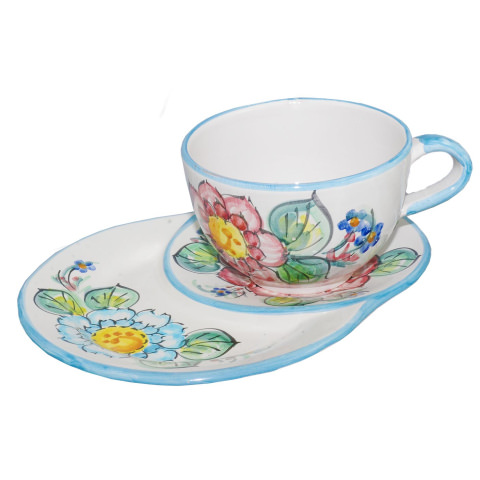  taza por leche con platillo por las gallettas decoro flores mezzo fondo blanco