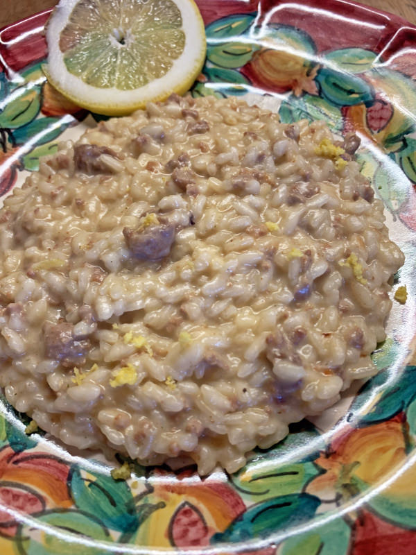 Recipe of Risotto with Certosa cheese and mince with a zest of lemon